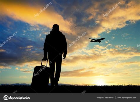 Man With Travel Suitcase Goldson Medical