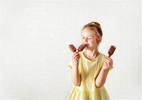Girl Licking Popsicle Stock Photos Pictures And Royalty Free Images Istock