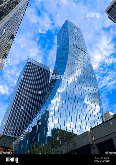 The New Rainier Square Tower Dwarfing The Old Rainier Tower In Downtown