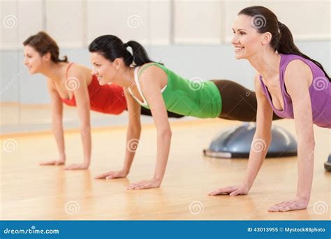 Three Sporty Women Doing Exercise On Ball Stock Image Image Of