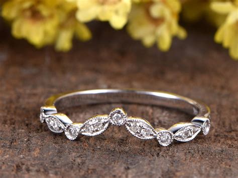 A wedding ring that is designed to be worn next to an engagement ring, shaped like an interlocking puzzle piece, is called a shadow band. Women Diamond Chevron Ring Eternity Band Art Deco V Shaped ...