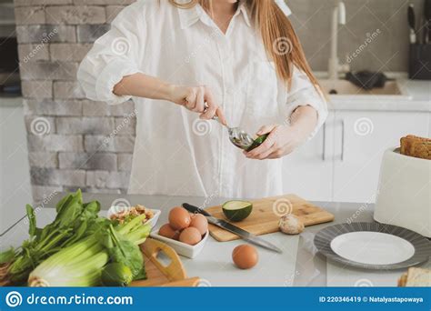Beautiful Girl In The Kitchen Prepares Healthy Food Stock Image Image