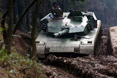 Type 96 Main Battle Tanks Cross Muddy Trench China Military