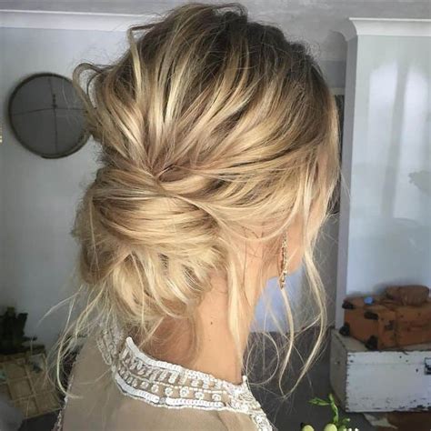 25 Hottest Low Messy Bun Hairstyles For 2024