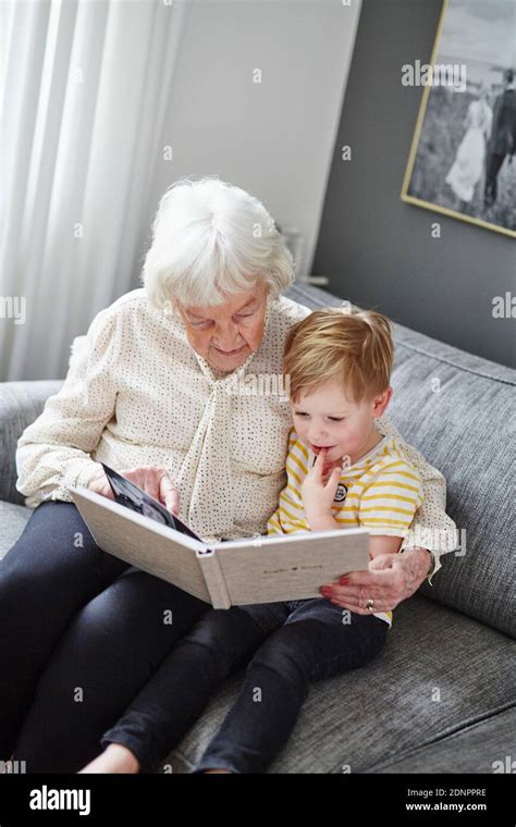 Grandmother Reading Children High Resolution Stock Photography And