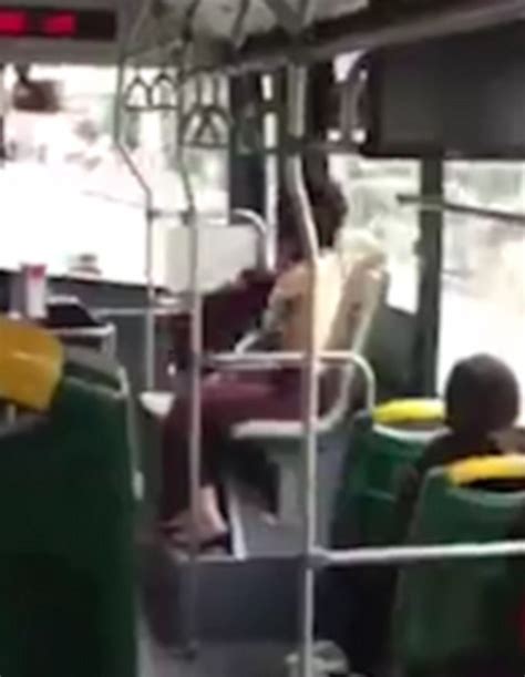 Bizarre Moment A Woman Strips Off And Sits On A Public Bus Topless In China Daily Mail Online
