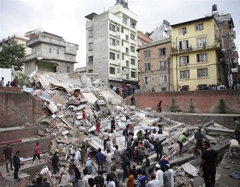 People Search For Survivors Stuck Under The Rubble Of A Destroyed Building After An Earthquake