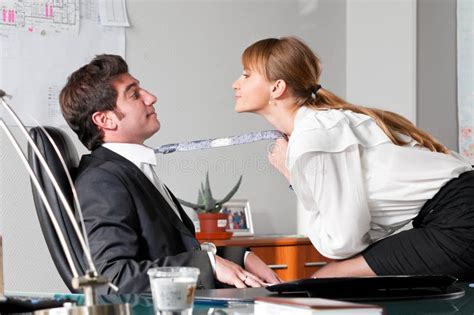 Flirting At Work Stock Photo Image Of Corporate Kissing