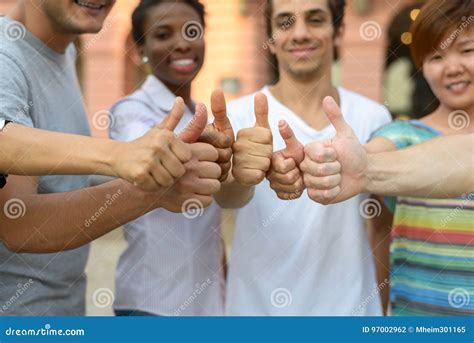 Group Of Students Giving Thumbs Up Stock Photo Image Of African