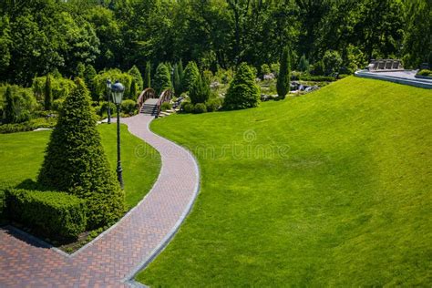 Landscaping At Golf Resort With Mansions On The Hill Stock Photo