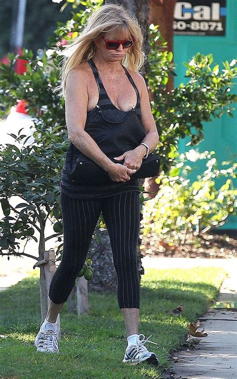 goldie hawn almost falls victim to the nip slip as she ventures out in her gym gear celebrity
