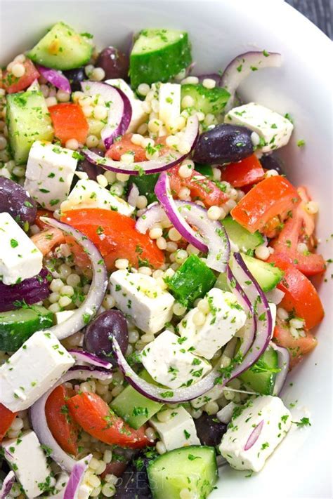 This link is to an external site that may or may not meet accessibility. Israeli Couscous Greek Salad Recipe in 2020 | Greek salad ...