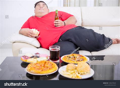 Overweight Man Eating Junk Foods Drinking Stock Photo 1505279525