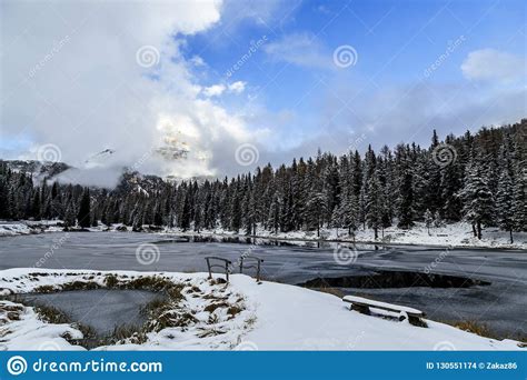 Alpine Lake In Front Of Tre Cime Di Lavaredo In A Winter