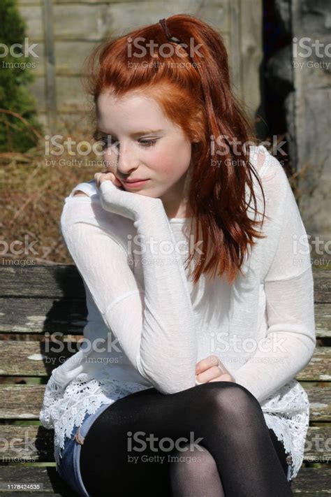 Image Of Red Haired Teenage Girl 14 15 With Pale Skin And Freckles Sat