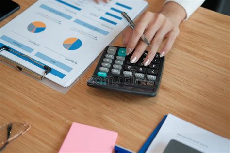 Financial Adviser Use Calculator To Calculate Revenue And Budget
