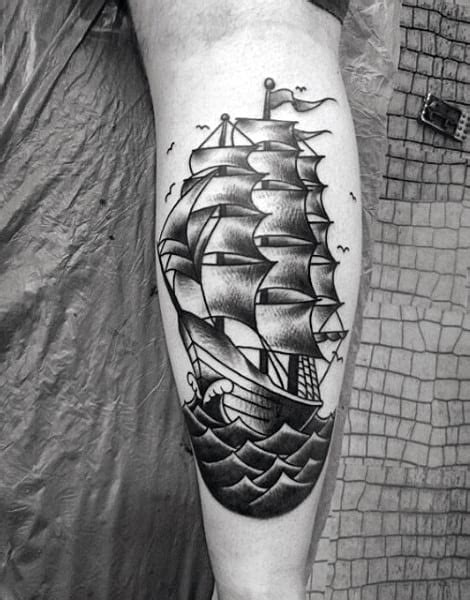 The tattoo is mostly black and white but there is a bit of color that makes the look punchy. Top 75 Best Sailor Tattoos For Men - Classic Nautical Designs