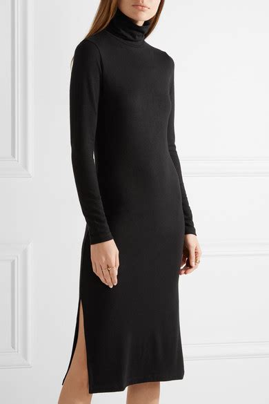 Get The Look Rita Oras New York City James Perse Black Turtleneck Side Slit Dress And Acne