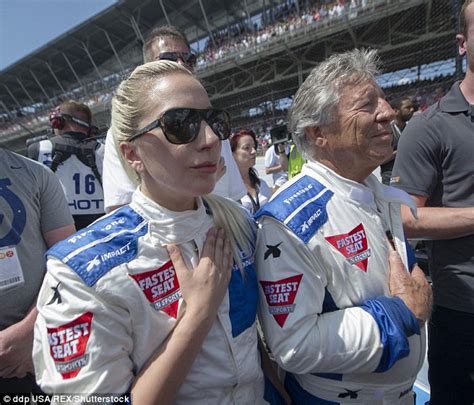 Lady Gaga Suits Up For High Speed Ride With Mario Andretti At Indy 500 Daily Mail Online