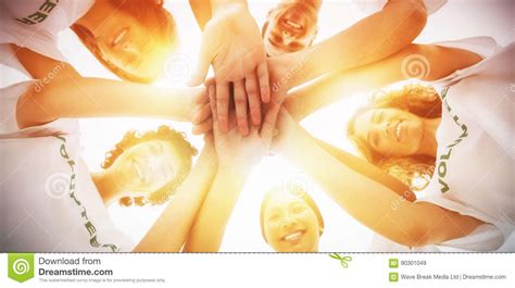 Cheerful Group Of Volunteers Putting Hands Together Stock Image Image
