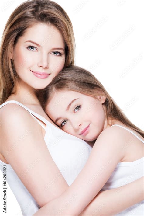Beautiful Young Mother With A Small Daughter 8 Years Embrace Eac Photos Adobe Stock