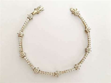 Sterling Silver Sparkling CZ Flower Chain Bracelet with Tongue and Box ...