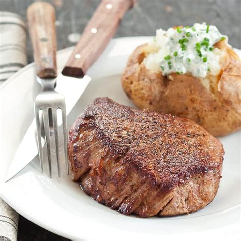 The beef tenderloin is an oblong muscle called the psoas major, which extends along the rear portion of the spine, directly behind the kidney, from about. Beef Tenderloin Steaks with Chive Baked Potatoes | Cook's Country