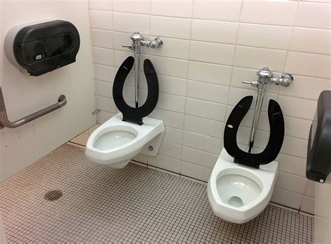This Bathroom Stall Has Two Toilets Right Next To Each Other And There