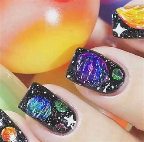 This way is pretty easy and only took me about twenty minutes. Planets | Galaxy nail art, Galaxy nails, Nail art diy