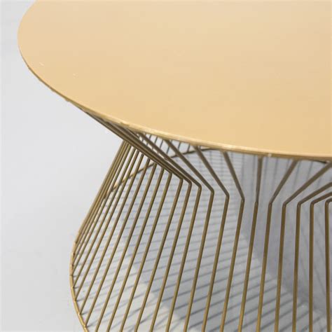 This center coffee table combines a clean, woodgrain european oak table top with a jagged, edged out style legs support. Luna Coffee Table, Gold - Juno Hire