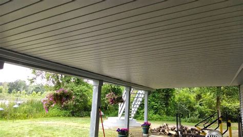 The underdeck ceiling system turns the space under your deck into a clean and enjoyable haven without costly reconstruction. Under Deck Ceiling Installation with A-Team Gutters