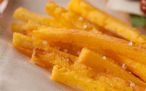 Working in batches, fry the polenta pieces until golden brown on all sides, about 3 minutes per side. Polenta Fries