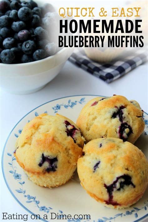 Three Blueberry Muffins Sitting On Top Of A Plate Next To A Bowl Of Berries