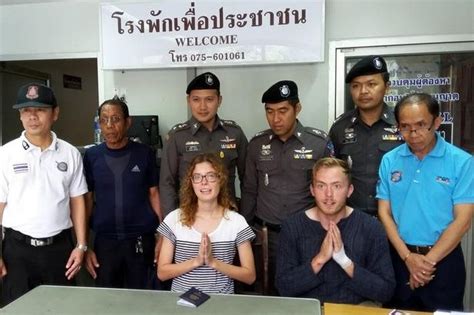 new pics show thai police parading irishman and us woman after alleged street sex act which
