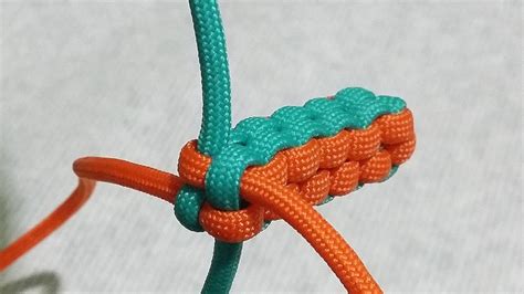 Take the other piece and weave it above the first one. How To Start A Lanyard Box Braid - All You Need Infos