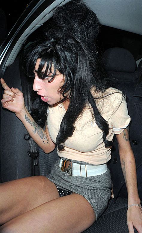 Amy Winehouse Showing Her Panties Upskirt In Car Paparazzi Pictures