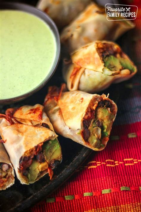 Wet fingers in some water and seal edges of egg rolls. Healthy Baked Fiesta Avocado Egg Rolls - favfamilyrecipes ...