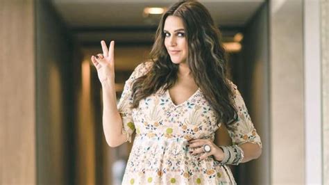 pregnant neha dhupia can t stop wearing affordable maternity dresses her latest costs rs 2 599