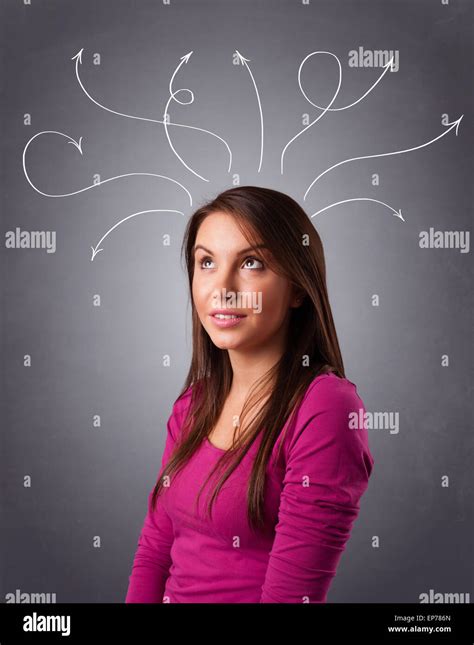 Young Girl Thinking With Arrows Overhead Stock Photo Alamy