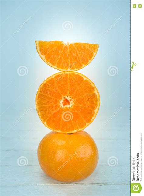 Oranges Close Up Whole Orange Fruit And Sliced Oranges On Wood Stock