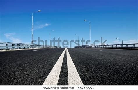 Empty Asphalt Road Goes Into Distance Stock Photo Edit Now 1589372272