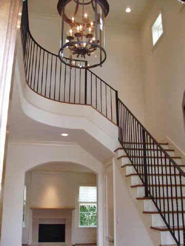 A fixture hung too high in a tall foyer will appear. Pin on The Walthours Blessing(Our Dream Home)