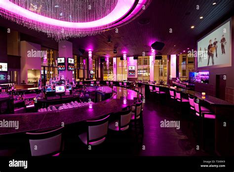Empty Nightclub Illuminated With Purple Neon Light Stock Photo Alamy