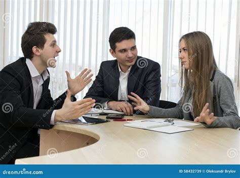 Group Of Three People Having Discussion Stock Image Image Of