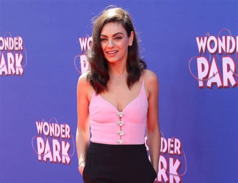 Mila Kunis Is Pretty In Pink As She Makes Solo Appearance On Wonder