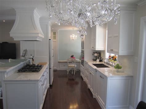 You can dress up or dress down these cabinets with accessories, countertops, and floors. Elegant fresh white kitchens - Traditional - Kitchen - Toronto - by Signature Custom Cabinets