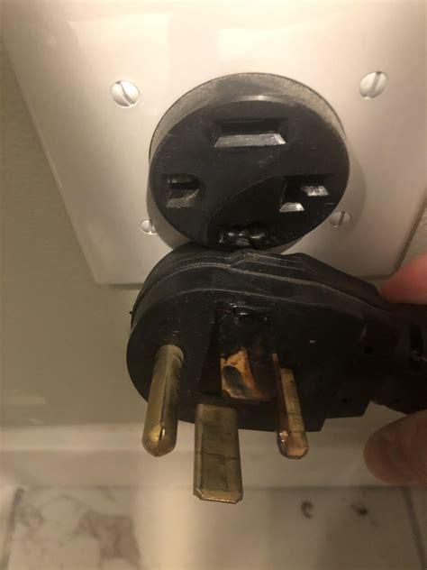 this-is-my-dryer-i-noticed-something-burning-and-i-noticed-the-smoke-coming-from-the-outlet