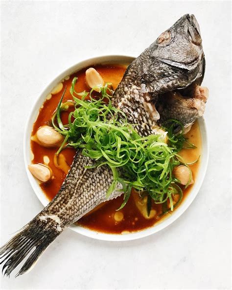Whole Roasted Black Sea Bass With Scallion Garlic Confit Garlic Oil Soy Sauce Beef Recipes