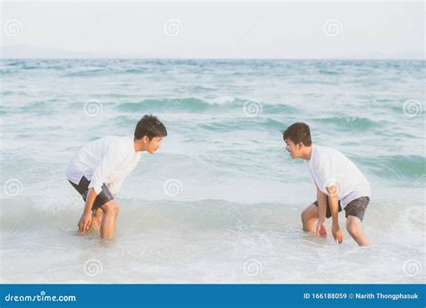 Homosexual Portrait Young Asian Couple Play Water On Beach With