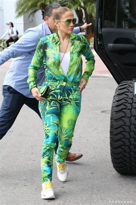 Jennifer Lopezs Versace Jungle Print Outfit In Miami Popsugar Fashion